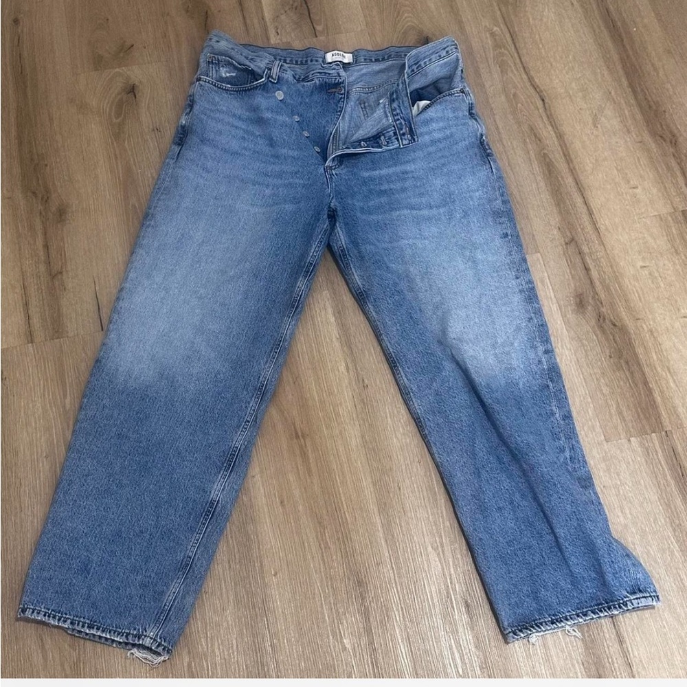 Agolde Blue Relaxed Jeans with Distressed Details and Criss Cross Waist